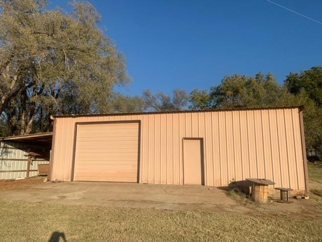 garage featuring a carport