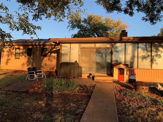 rear view of house featuring a patio area