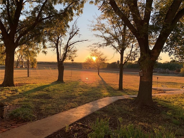 surrounding community featuring a lawn