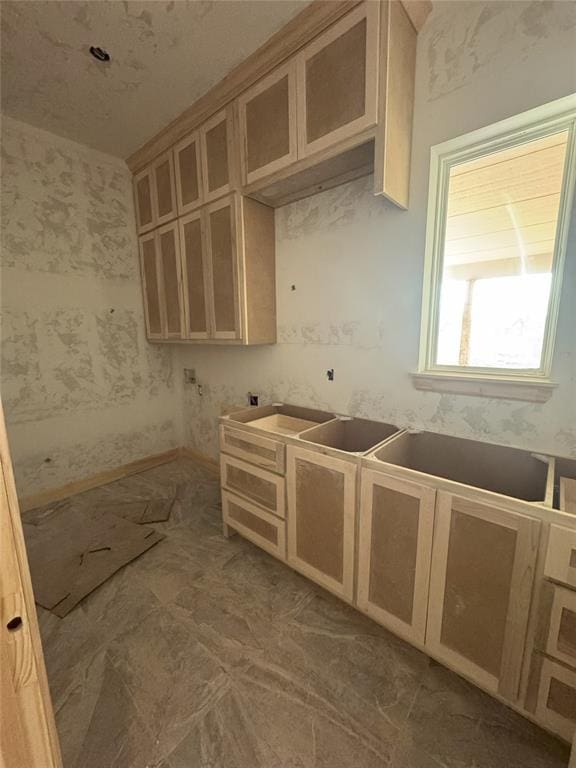 kitchen with light brown cabinets