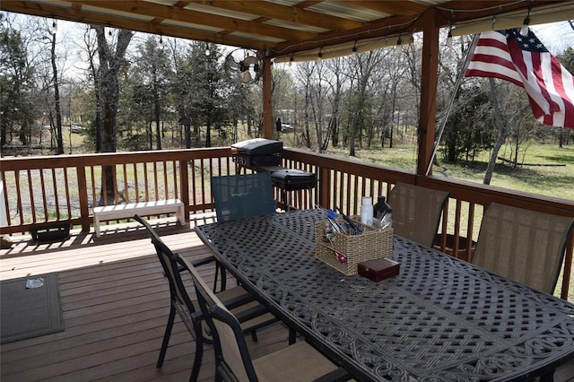 deck with outdoor dining space