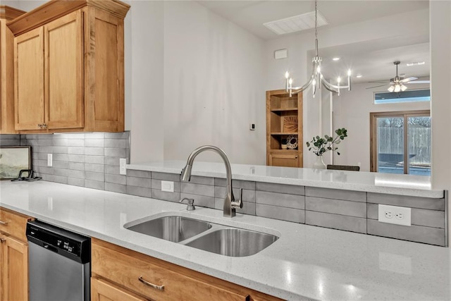 kitchen with decorative backsplash, light stone countertops, ceiling fan, sink, and dishwasher