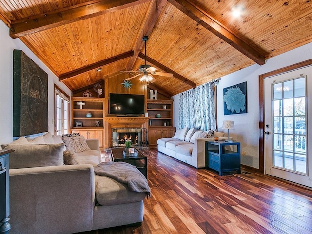 living room featuring wood ceiling and beam ceiling