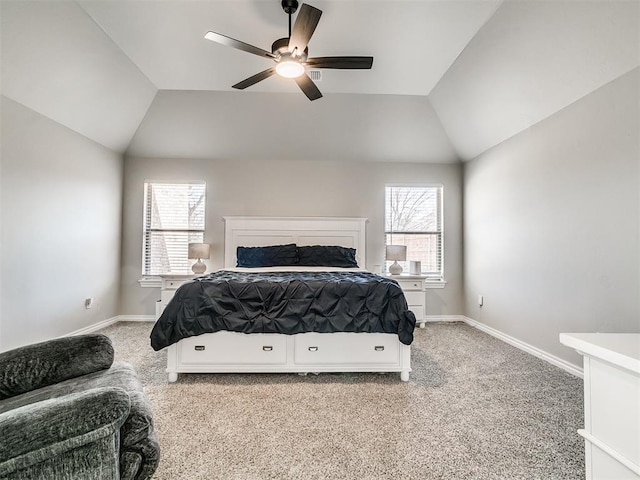 carpeted bedroom featuring ceiling fan and lofted ceiling