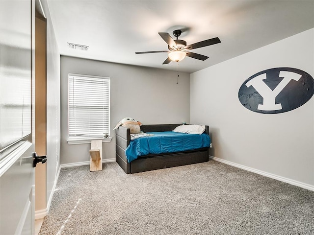 carpeted bedroom with ceiling fan