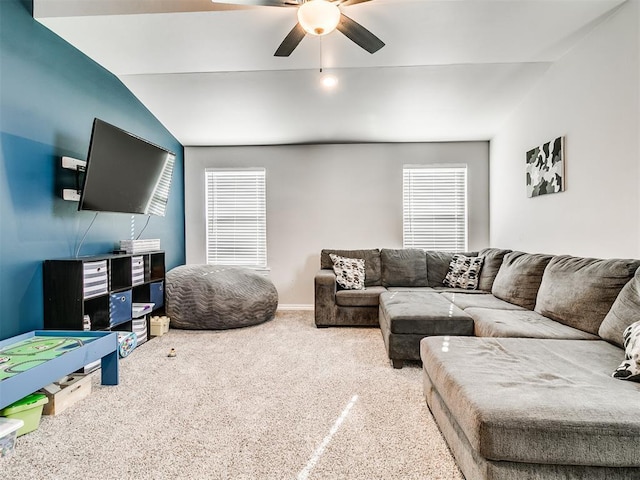 living room featuring vaulted ceiling, ceiling fan, and carpet floors