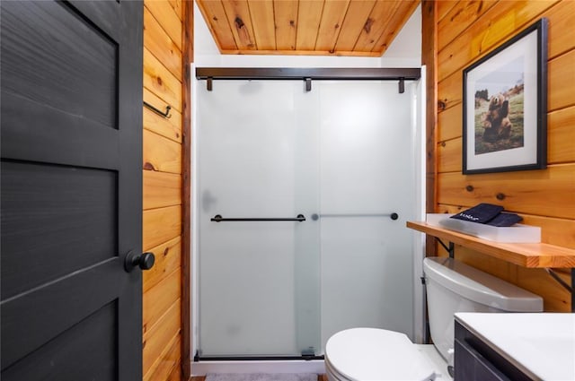 bathroom featuring toilet, wooden ceiling, wood walls, and a shower with shower door