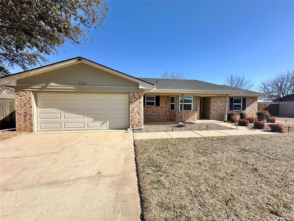 ranch-style home with a garage