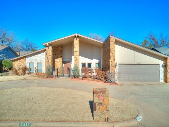 view of front of property with a garage