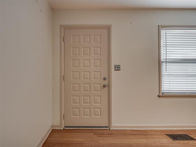 entrance foyer featuring light wood-type flooring