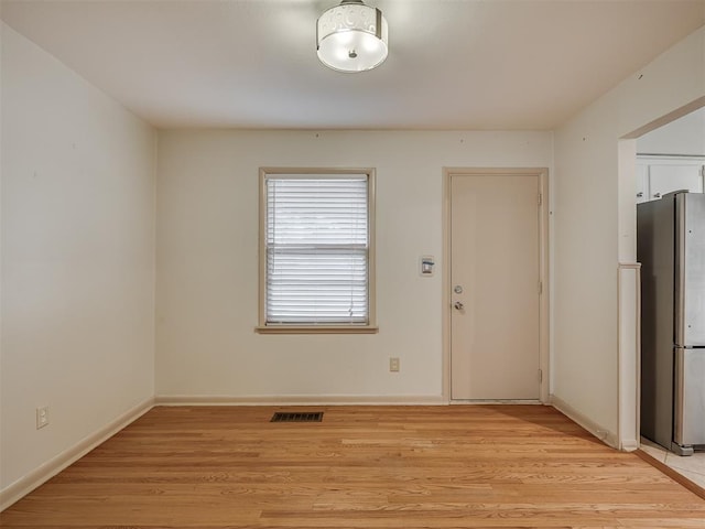 interior space with light hardwood / wood-style floors