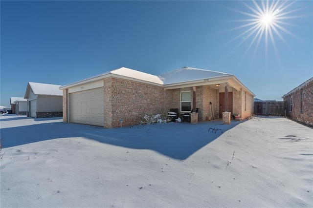 ranch-style home with a garage