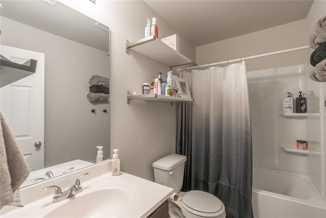 full bathroom featuring vanity, shower / tub combo, and toilet