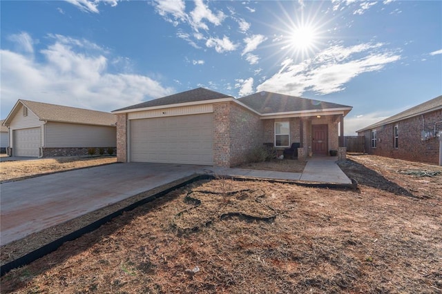 ranch-style house featuring a garage