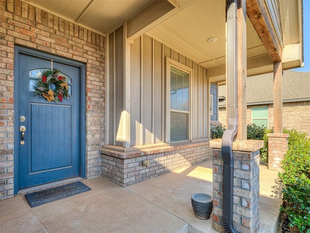 property entrance with covered porch