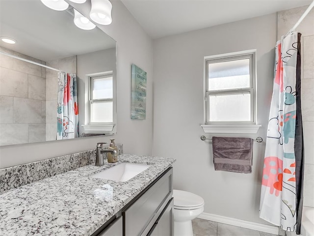 bathroom featuring a chandelier, tile patterned floors, vanity, and toilet