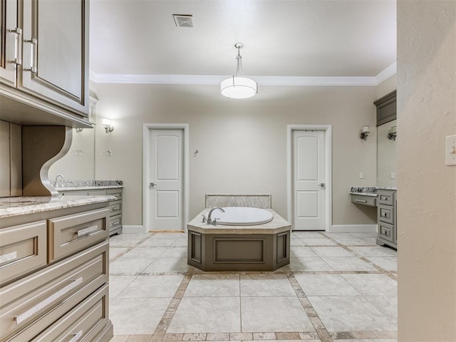 bathroom featuring a tub to relax in, ornamental molding, and vanity