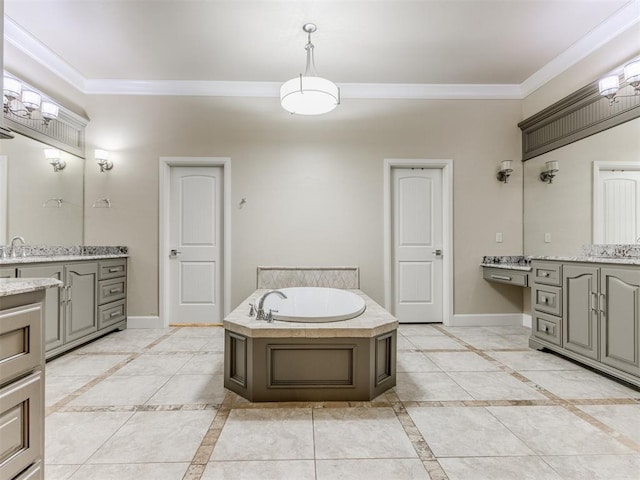 bathroom featuring crown molding, a tub, and vanity