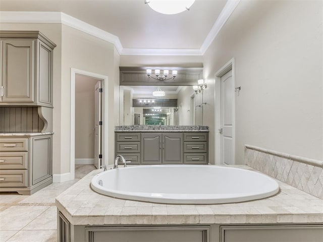 bathroom with vanity, a notable chandelier, crown molding, and tiled bath