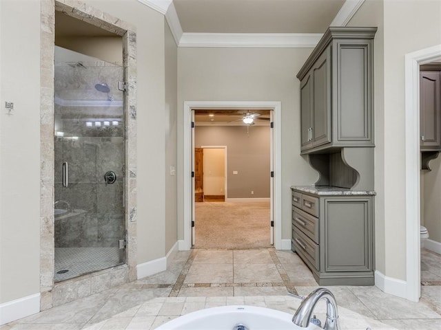 bathroom featuring crown molding, ceiling fan, and plus walk in shower