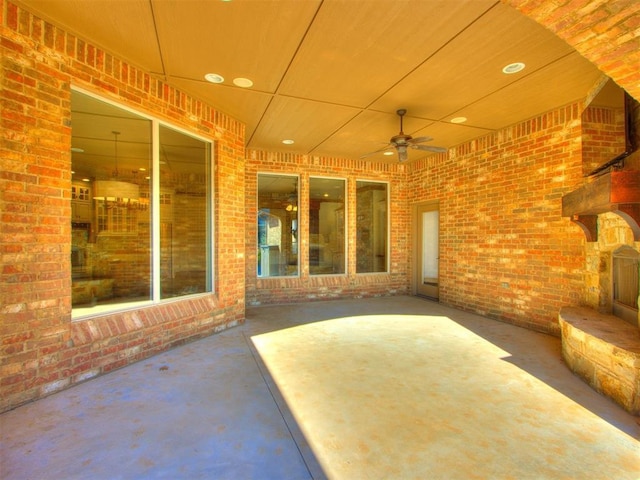 view of patio featuring ceiling fan