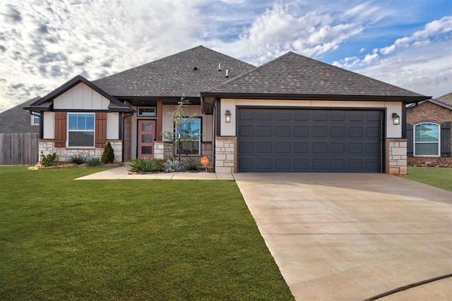 view of front facade featuring a garage and a front yard