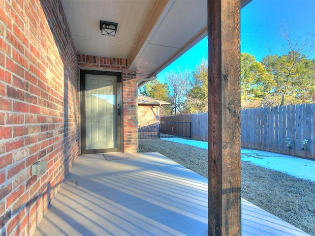 wooden deck with a patio area