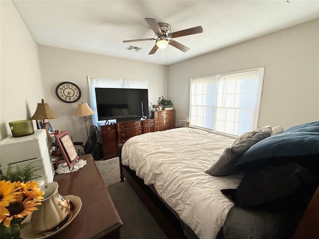 bedroom featuring ceiling fan and carpet floors