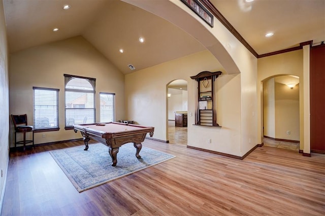 rec room featuring hardwood / wood-style flooring, ornamental molding, a high ceiling, and billiards