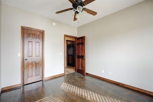 unfurnished bedroom featuring hardwood / wood-style flooring and ceiling fan