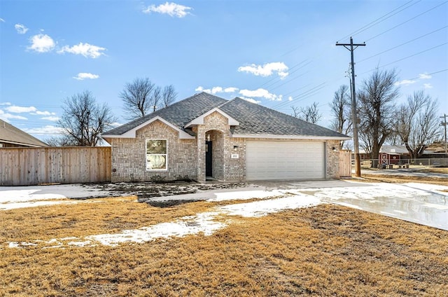 view of front of home with a garage