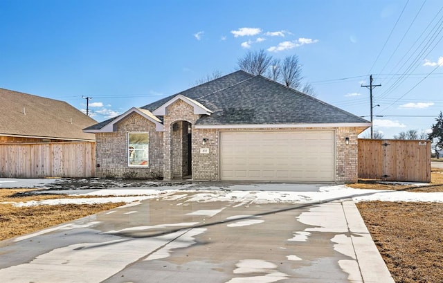 view of front of property with a garage