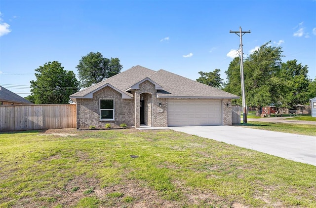 202 E Main St, Calumet, OK 73014 - view of front of property featuring a garage, concrete driveway, brick siding, and a shingled roof