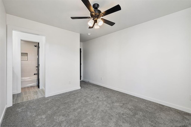 202 E Main St, Calumet, OK 73014 - unfurnished bedroom with carpet, baseboards, and ceiling fan