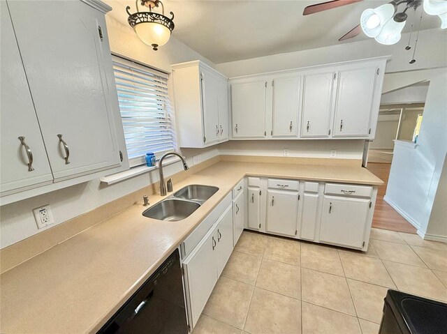 kitchen featuring sink, white cabinets, and light tile patterned flooring