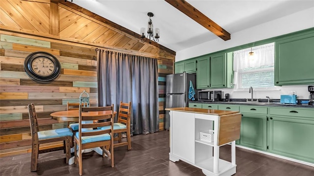 kitchen featuring sink, vaulted ceiling with beams, dark hardwood / wood-style floors, wooden walls, and green cabinetry