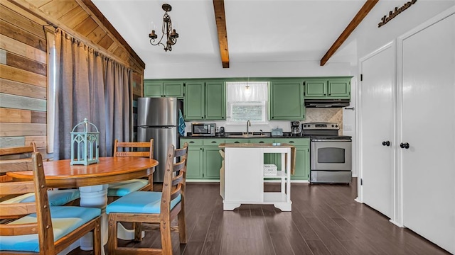 kitchen featuring appliances with stainless steel finishes, pendant lighting, green cabinets, and beam ceiling