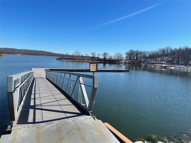 view of dock with a water view