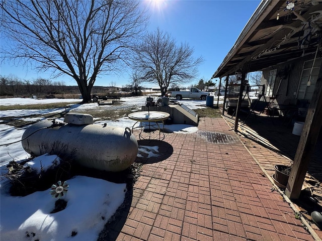 view of snow covered patio