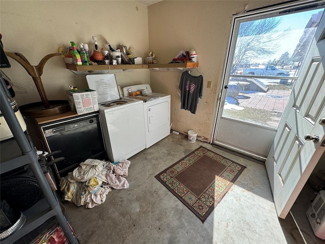 clothes washing area with laundry area and separate washer and dryer