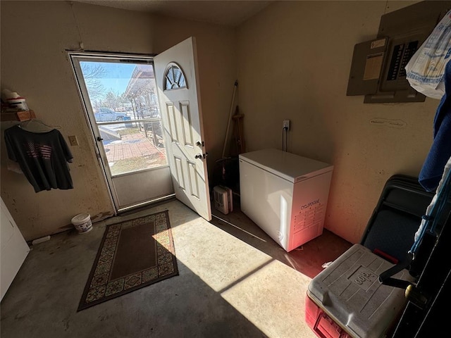 laundry room with electric panel