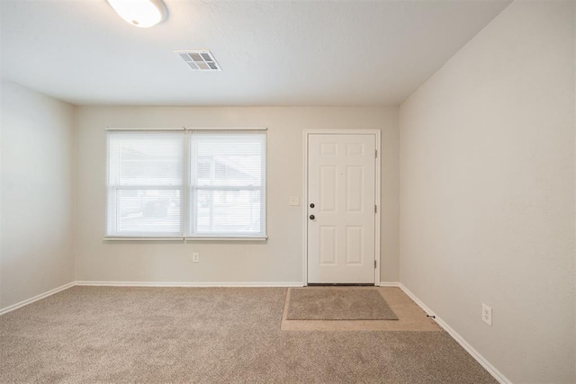 view of carpeted entryway