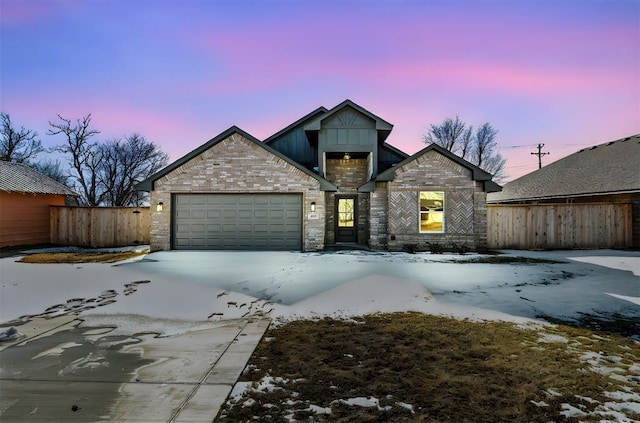 view of front of property featuring a garage