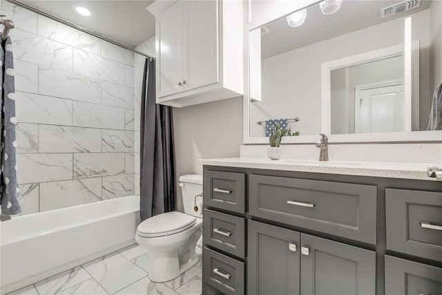 full bathroom featuring shower / bath combination with curtain, vanity, and toilet