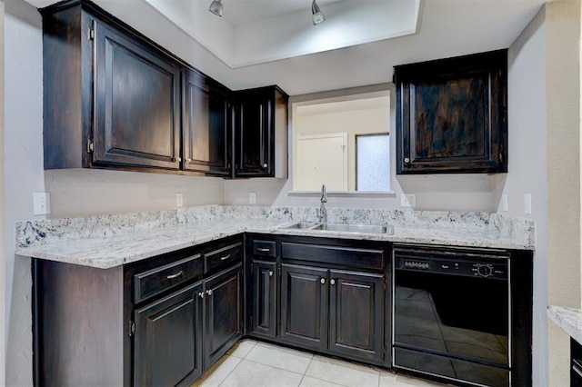 kitchen featuring sink, dishwasher, and light tile patterned floors