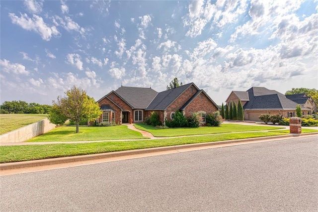 ranch-style home with a front lawn