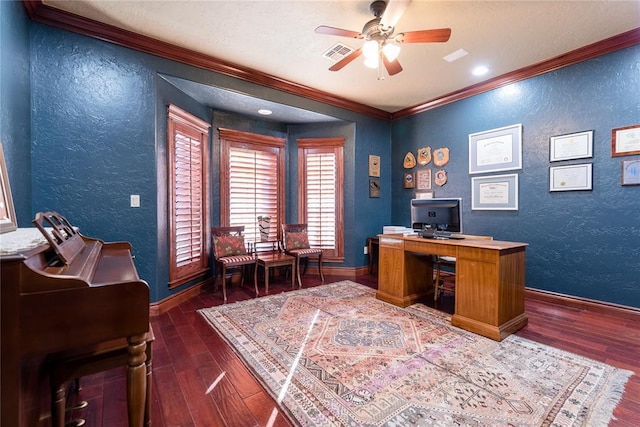 office space with ornamental molding, dark wood-type flooring, and ceiling fan