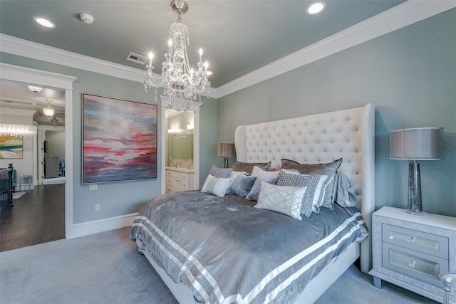 bedroom with ensuite bathroom, crown molding, carpet, and a notable chandelier