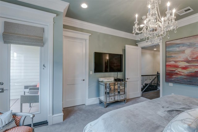 bedroom featuring carpet, ornamental molding, and a notable chandelier