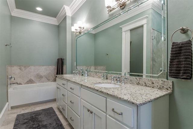 bathroom with tile patterned flooring, a bath, vanity, and crown molding